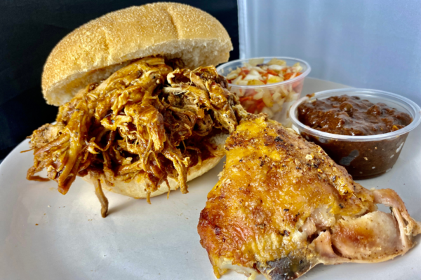 Pulled pork sandwich and Chicken leg with BBQ Sauce and Coleslaw